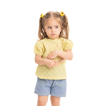 set of lemon yeloow shirt with flower decorations with blue short with flower decorations