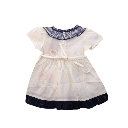 White dress with navy blue