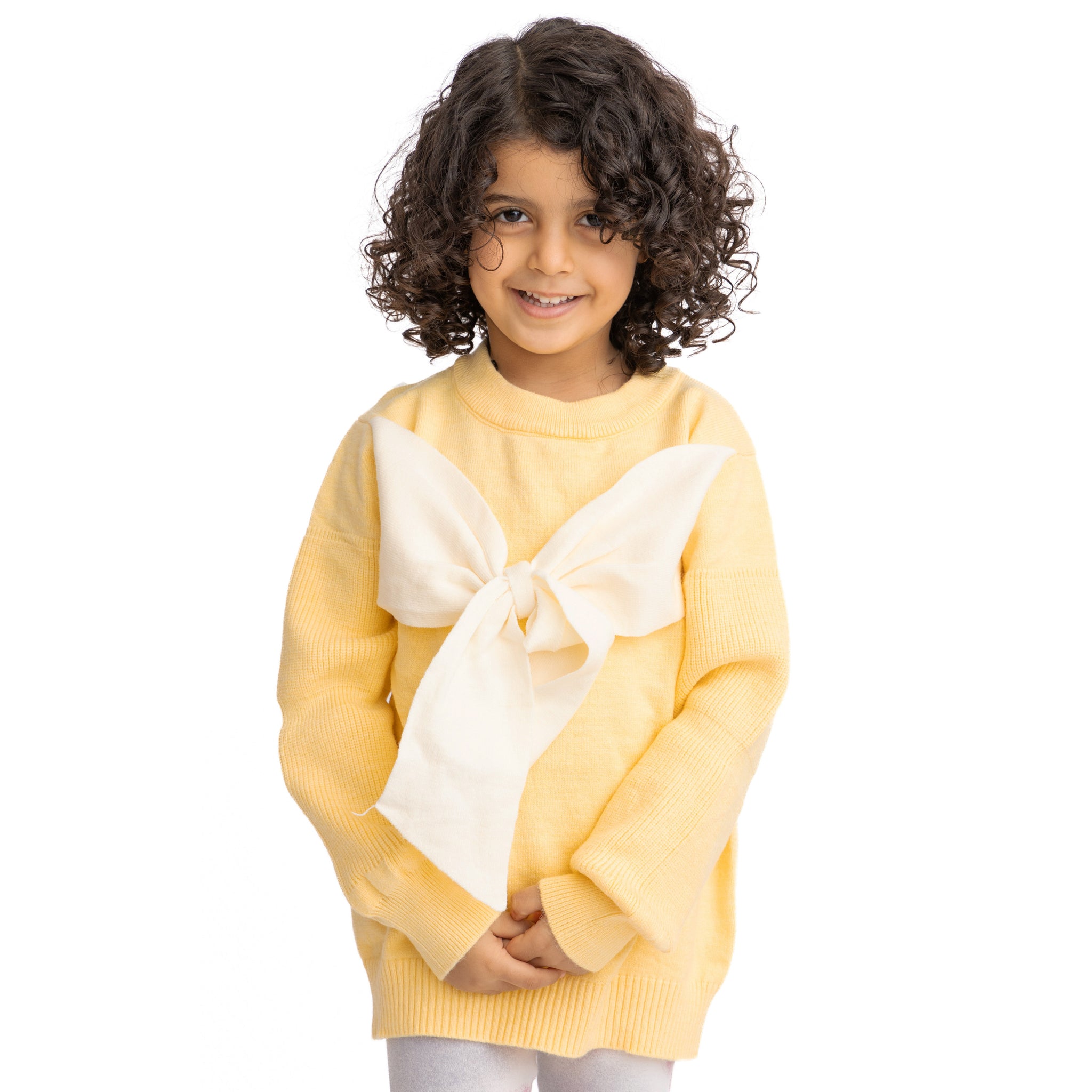 yellow shirt with heart shaped decorations