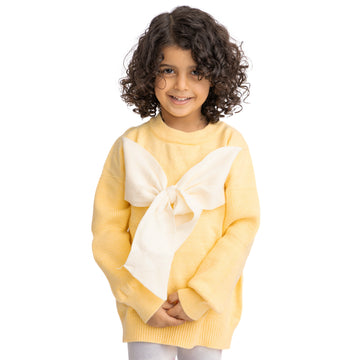 yellow shirt with heart shaped decorations