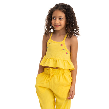 yellow sleeveless shoulder laced blouse with flower stitching