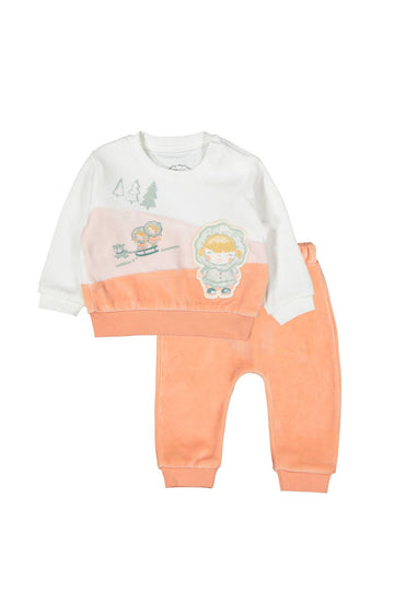 a white pink and orange shirt with sheep print and orange pants pyjama