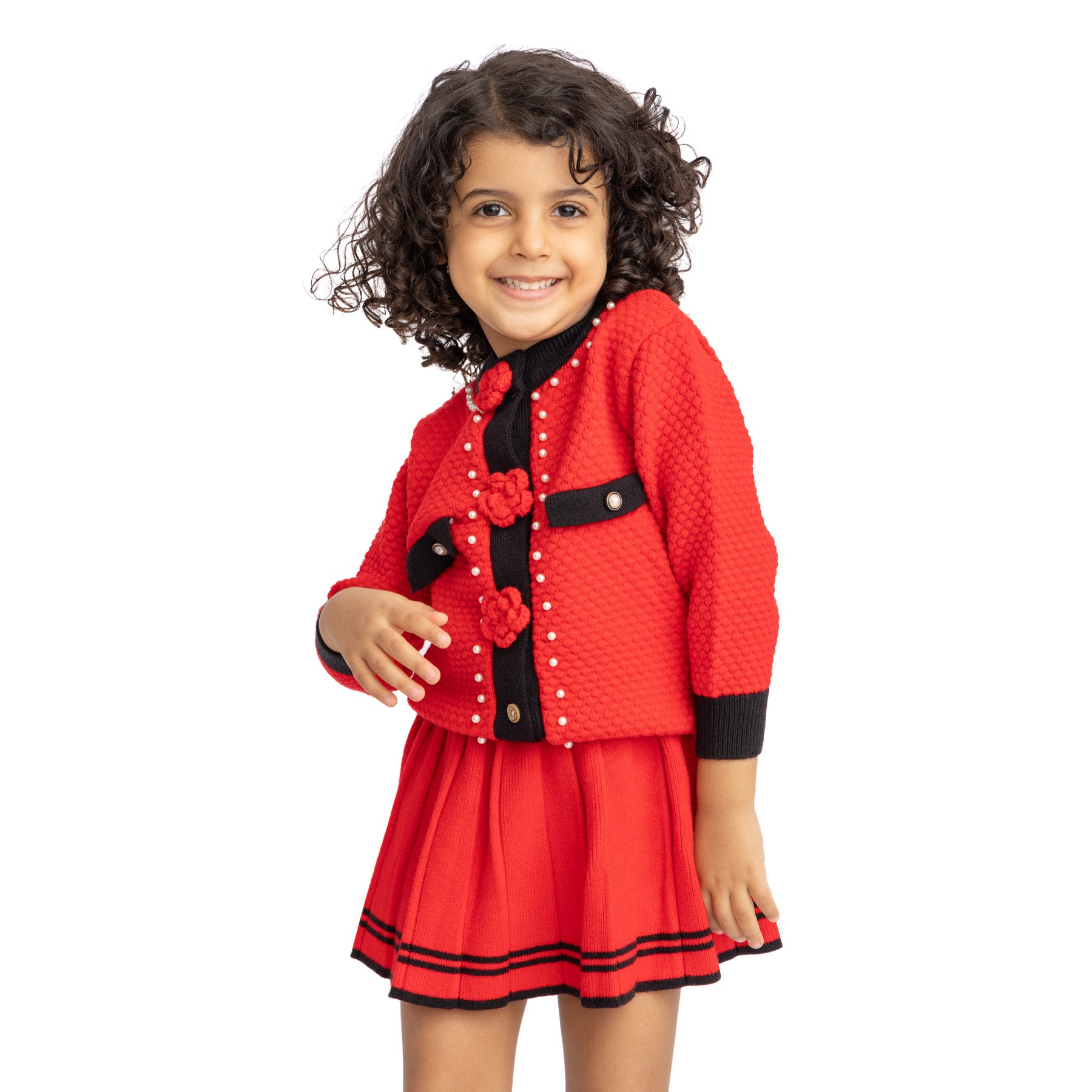 set of red jacket with flower decorations and red skirts