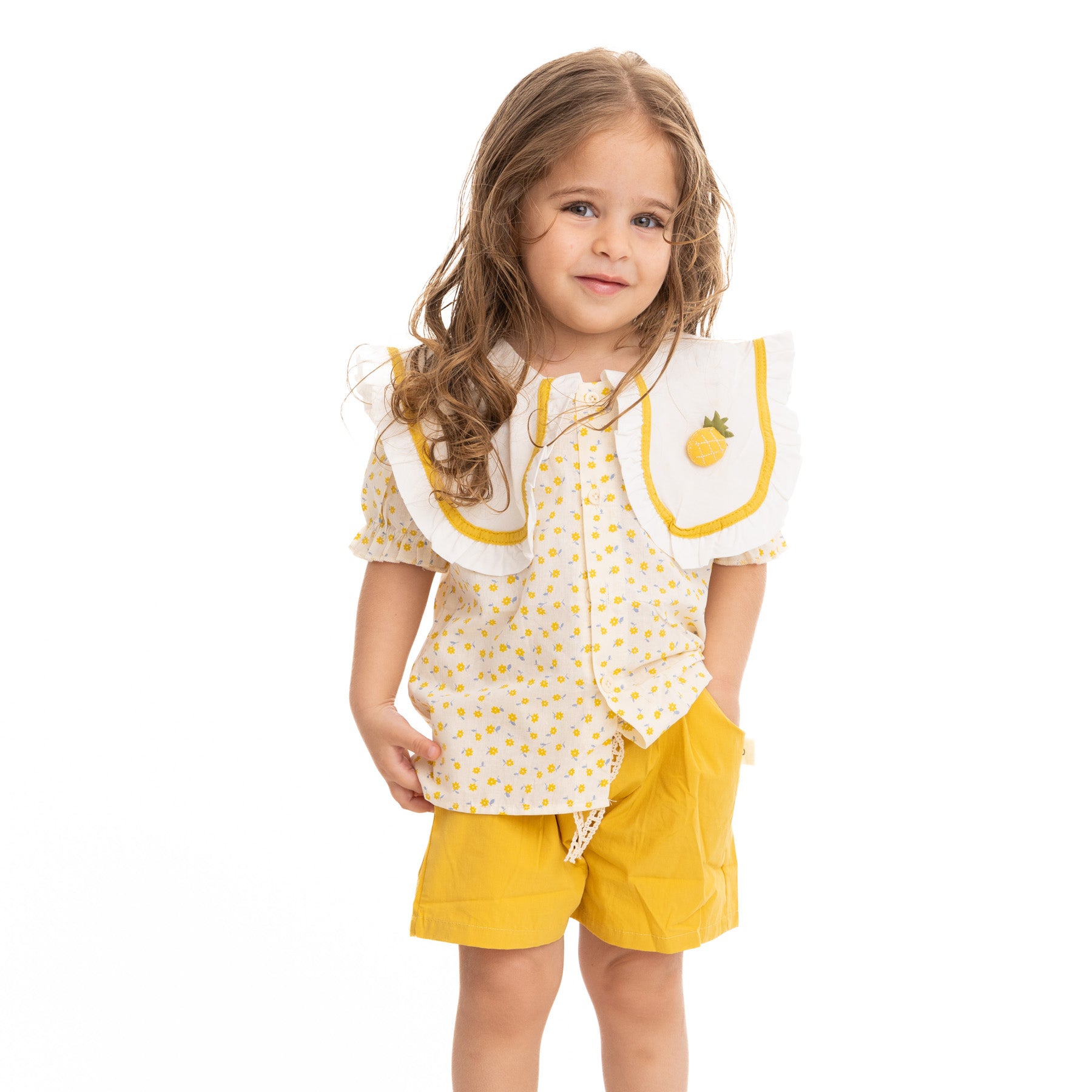 set of half sleeve blouse with all over print and yellow shorts