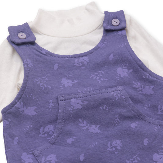 purple bodysuit and white shirt