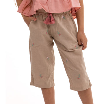 beige pants with all over stitching