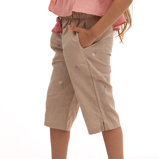 beige pants with all over stitching