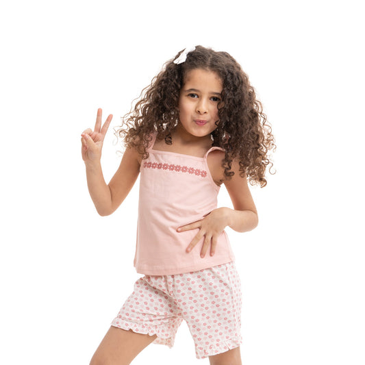 set of pink shoulder starpped top and white short with all over print