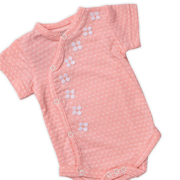 girl's pink jumpsuit with flowers