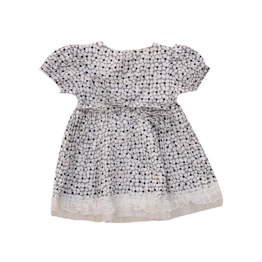 White dress with satin ribbon