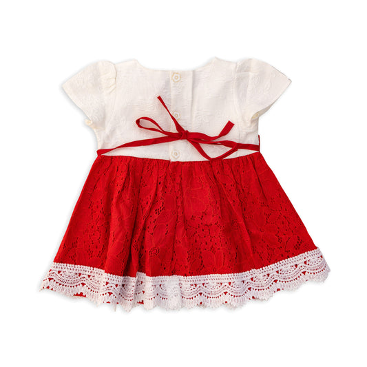 Dress with satin belt and rose pin