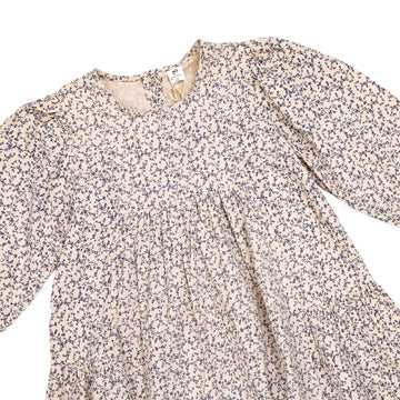Girls' dress in beige with a floral print