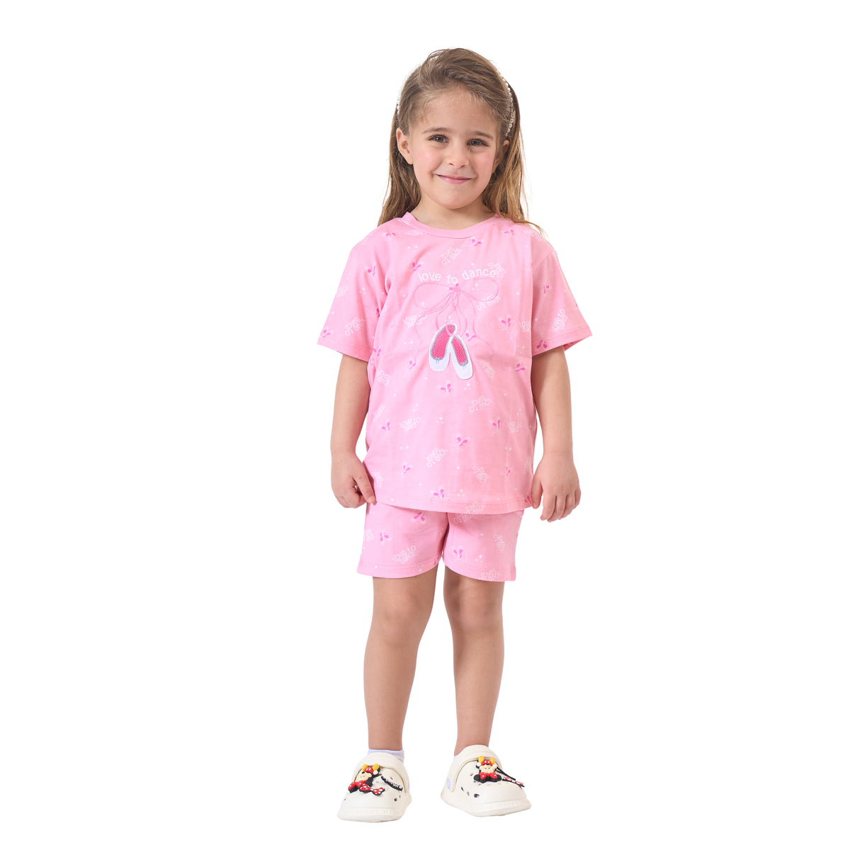 Girls' Cute Pink Pajama Set with a Bow Print
