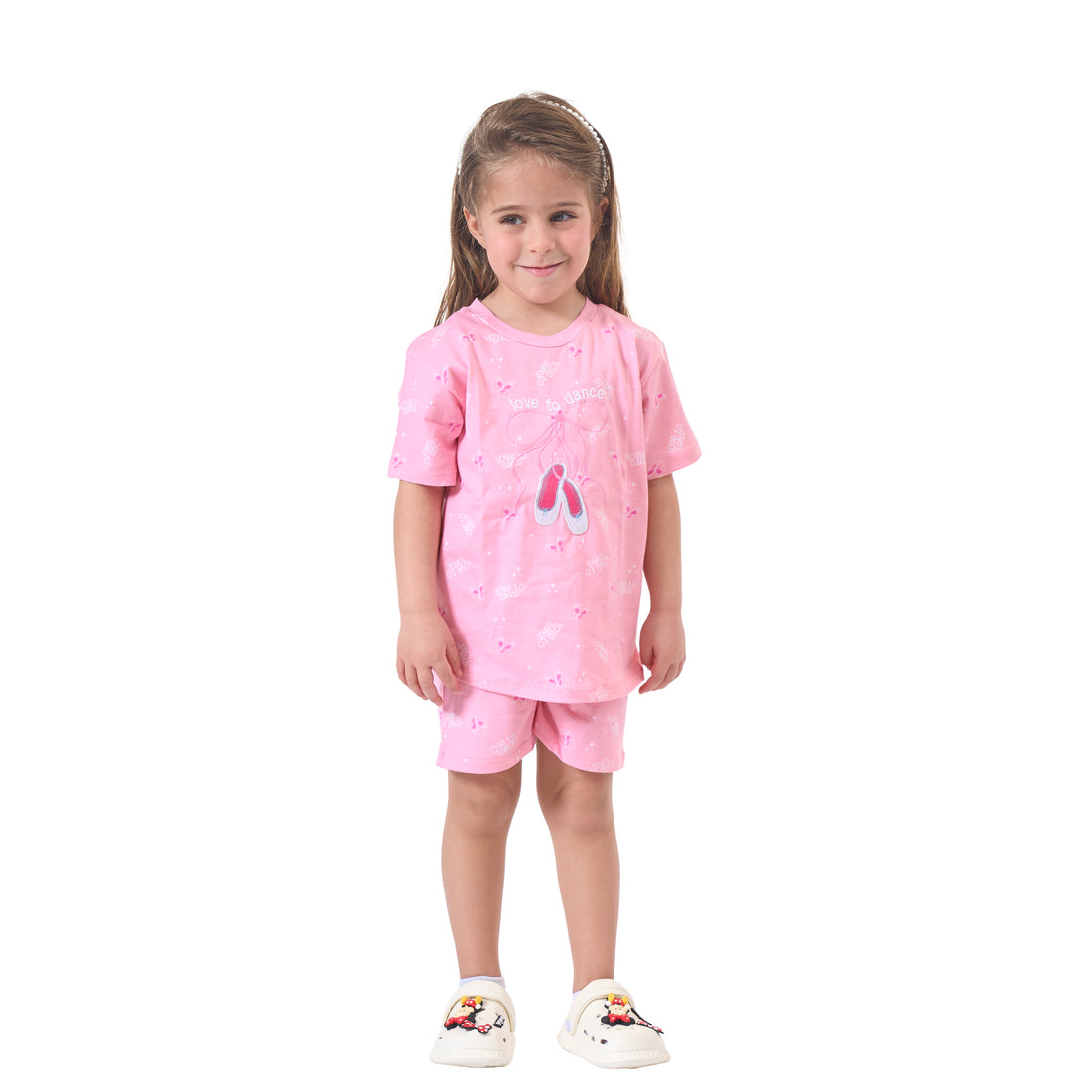 Girls' Cute Pink Pajama Set with a Bow Print
