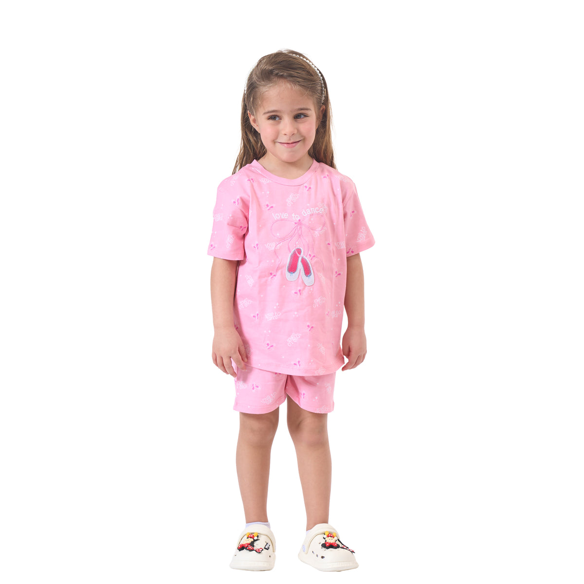 Girls' Cute Pink Pajama Set with a Bow Print