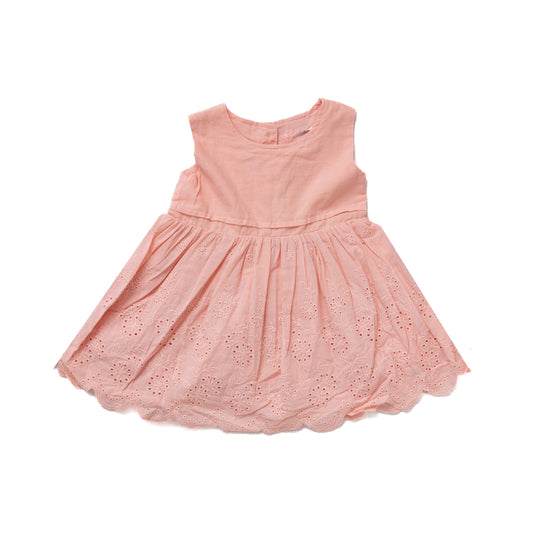 pink sleeveless dress with decorations