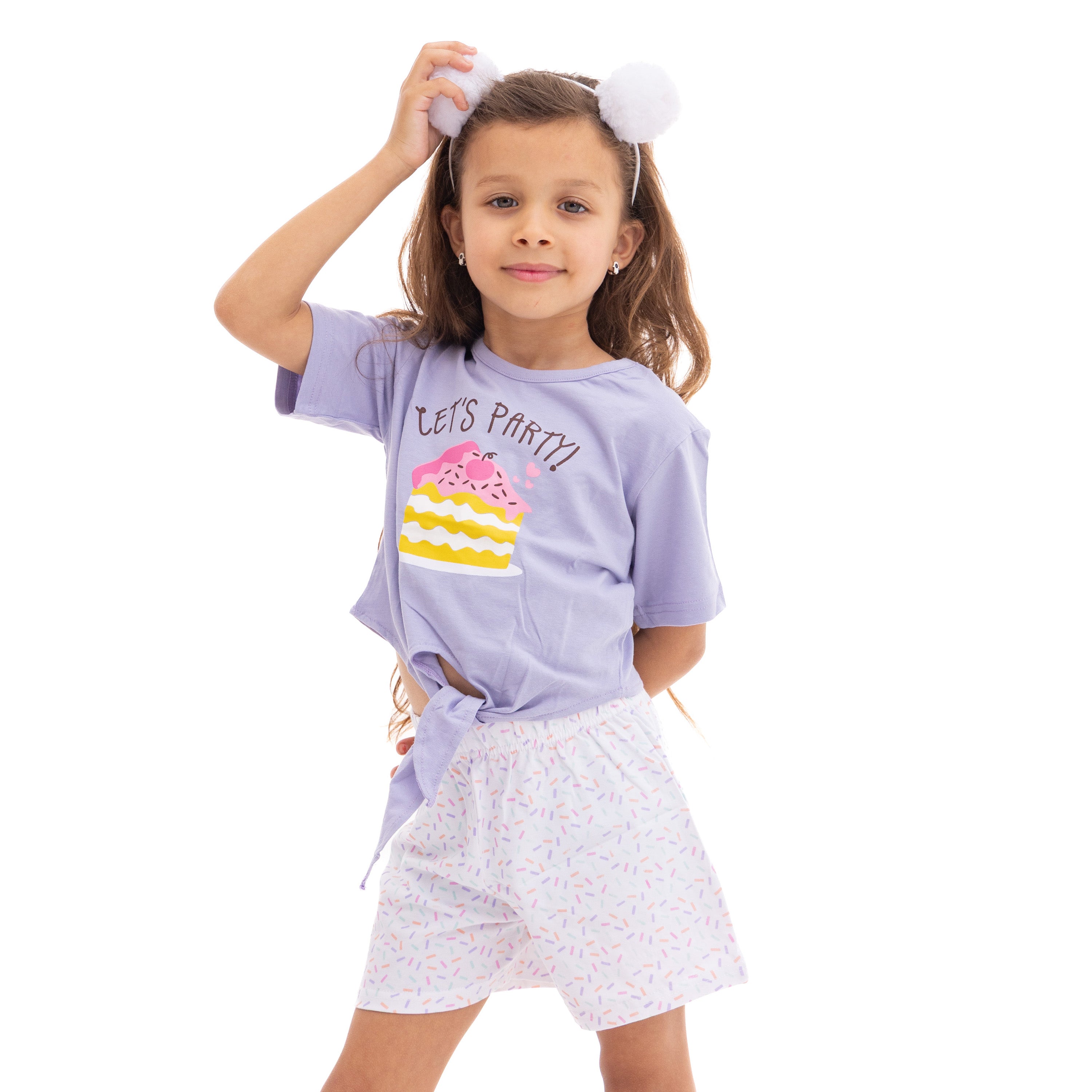 Girls' A Young Girl Is Smiling and Standing