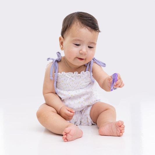 white onesie with all over print