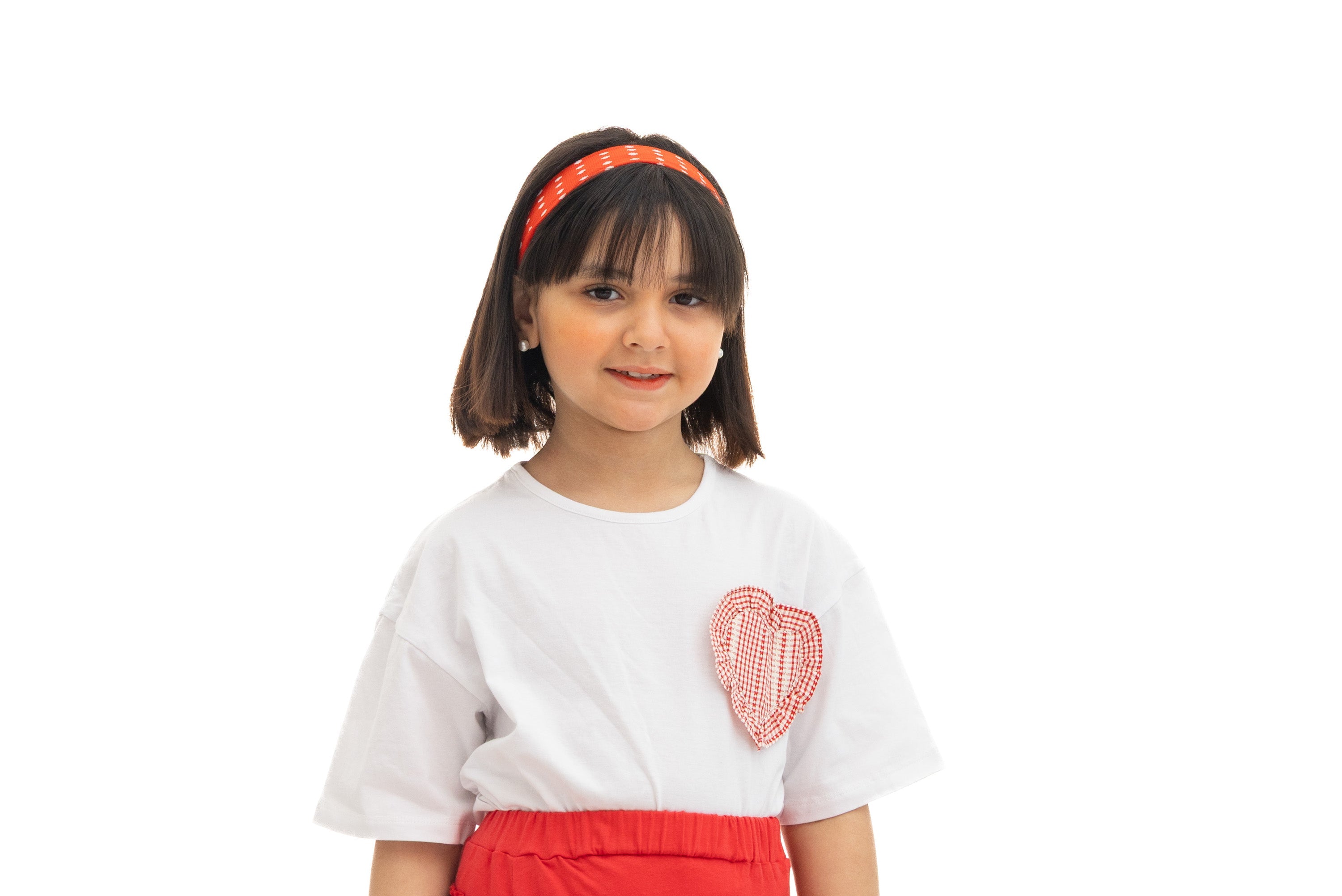 White Shirt with Red Heart Patch