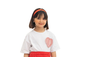 White Shirt with Red Heart Patch