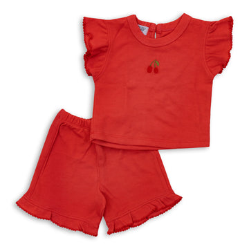 red top and short outfit