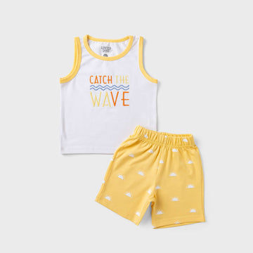 sleeveless white shirt with print and yellow short with print