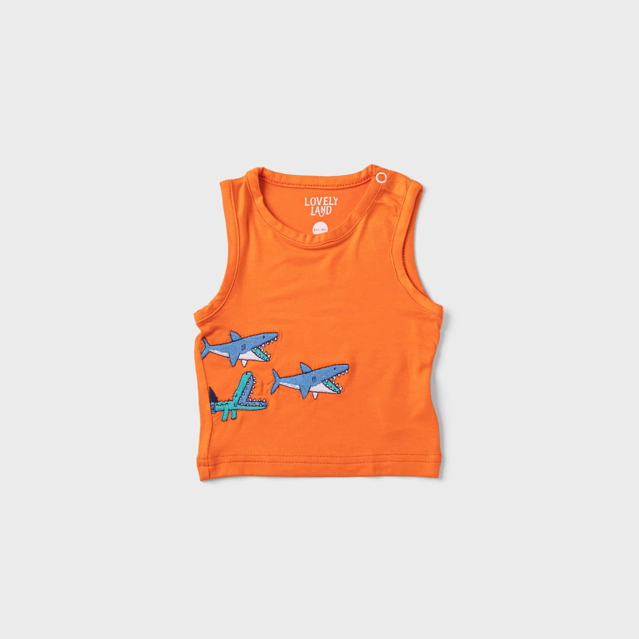 sleeveless orange with shar print shirt